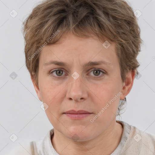 Joyful white adult female with short  brown hair and brown eyes