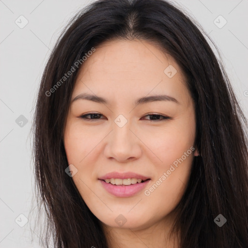 Joyful asian young-adult female with long  brown hair and brown eyes