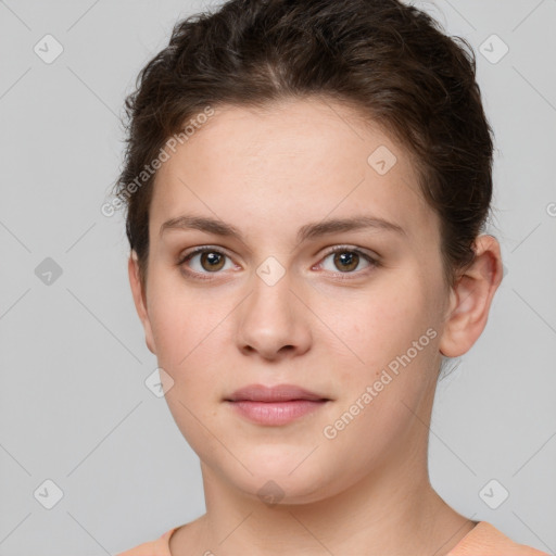 Neutral white young-adult female with short  brown hair and brown eyes