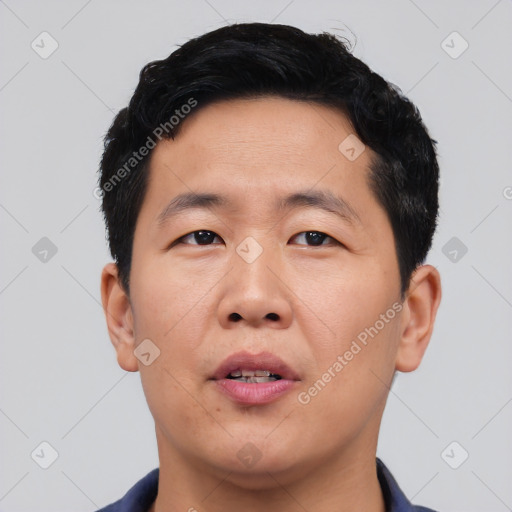 Neutral asian young-adult male with short  black hair and brown eyes