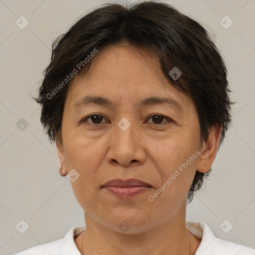 Joyful white adult female with medium  brown hair and brown eyes