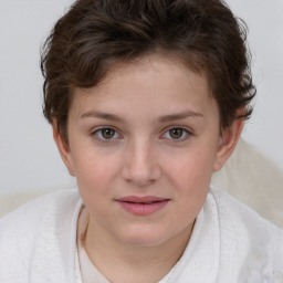 Joyful white child female with short  brown hair and brown eyes