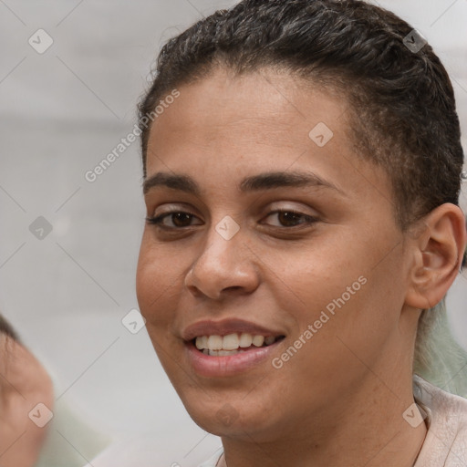 Joyful white young-adult female with short  brown hair and brown eyes