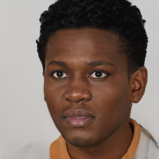 Neutral black young-adult male with short  brown hair and brown eyes