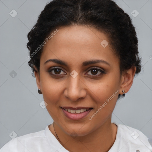 Joyful latino young-adult female with short  brown hair and brown eyes