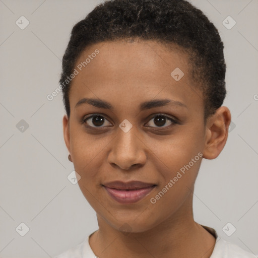 Joyful black young-adult female with short  brown hair and brown eyes