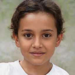 Joyful white child female with short  brown hair and brown eyes