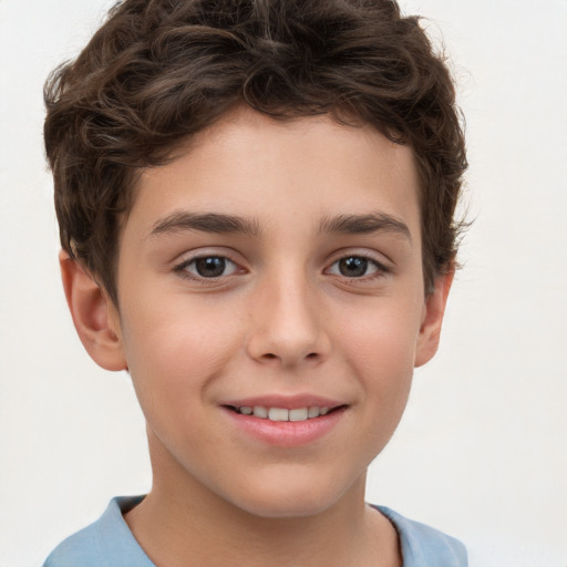 Joyful white child male with short  brown hair and brown eyes