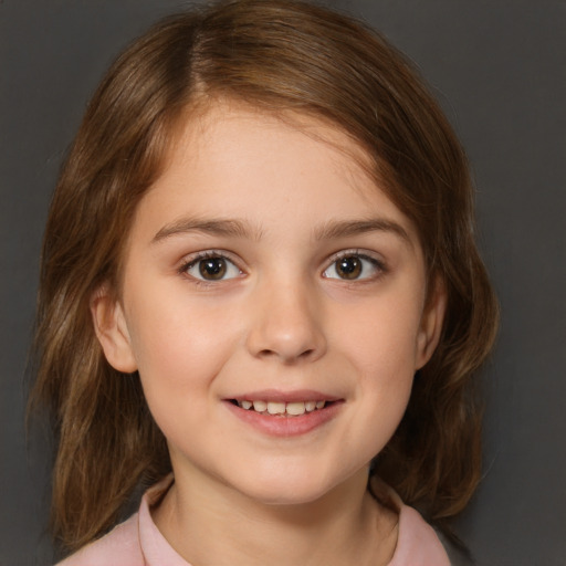 Joyful white child female with medium  brown hair and brown eyes