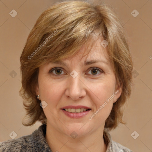 Joyful white adult female with medium  brown hair and brown eyes