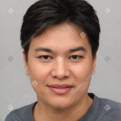 Joyful asian young-adult male with short  brown hair and brown eyes