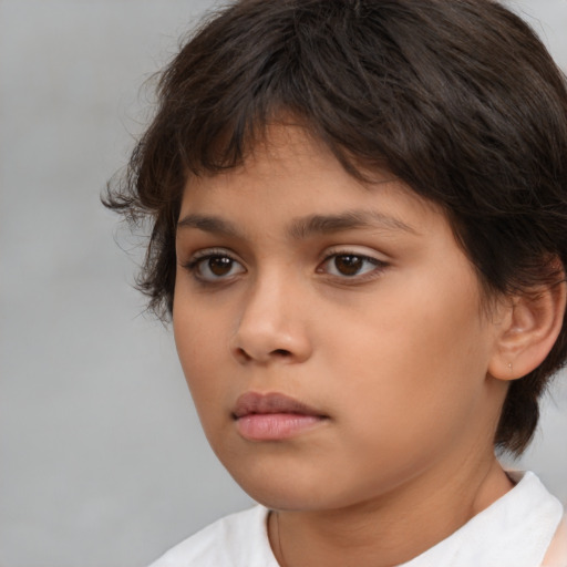Neutral white child female with medium  brown hair and brown eyes