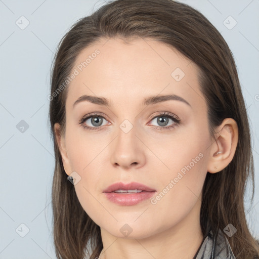 Neutral white young-adult female with long  brown hair and brown eyes