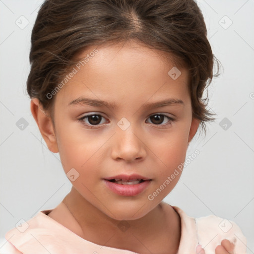 Joyful white child female with short  brown hair and brown eyes