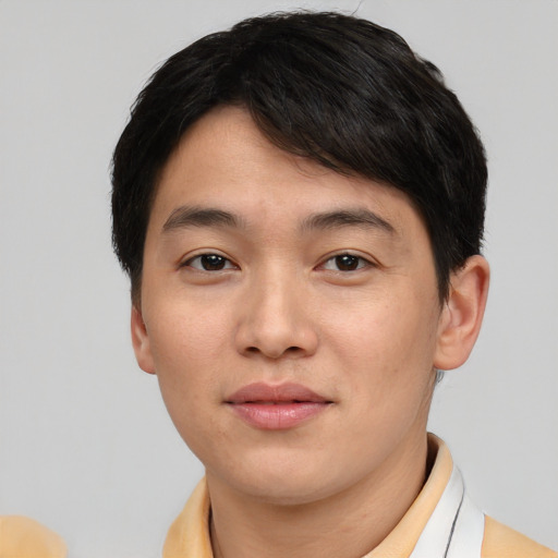 Neutral asian young-adult male with short  brown hair and brown eyes