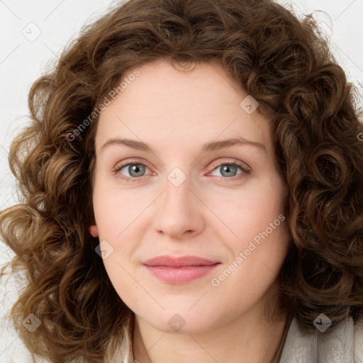 Joyful white young-adult female with medium  brown hair and green eyes