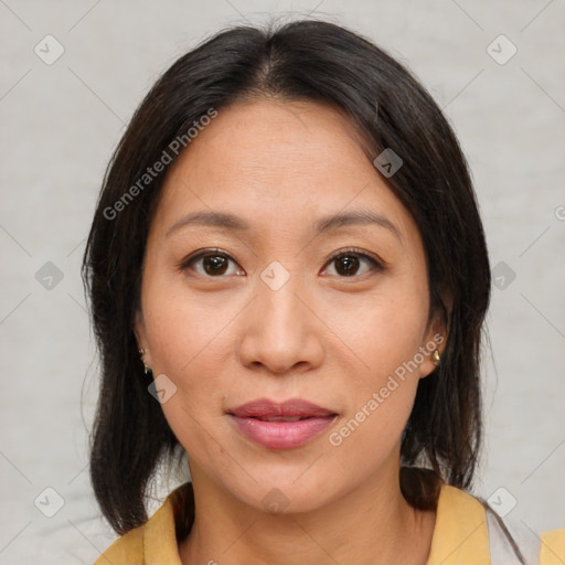 Joyful asian young-adult female with medium  brown hair and brown eyes