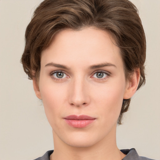 Neutral white young-adult female with short  brown hair and brown eyes