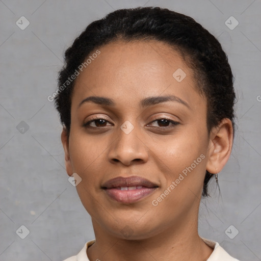 Joyful latino young-adult female with short  black hair and brown eyes