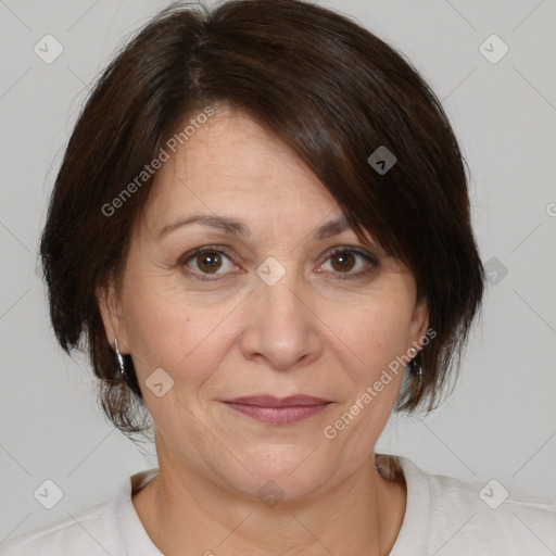 Joyful white adult female with medium  brown hair and brown eyes