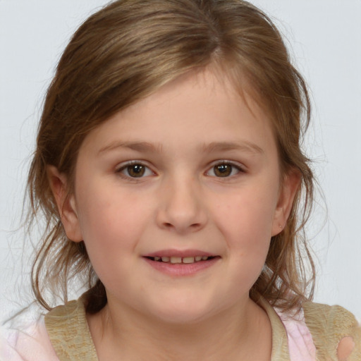 Joyful white child female with medium  brown hair and brown eyes