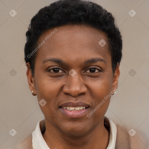 Joyful black young-adult female with short  black hair and brown eyes