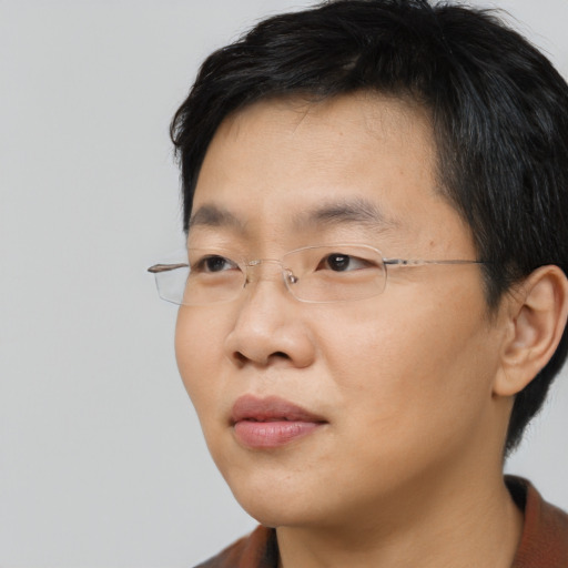 Neutral asian young-adult male with short  black hair and brown eyes