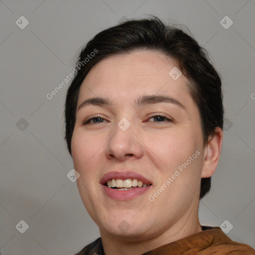 Joyful white young-adult female with short  brown hair and brown eyes