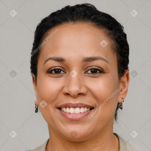 Joyful latino young-adult female with short  brown hair and brown eyes