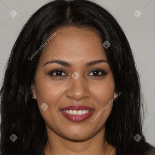 Joyful black young-adult female with long  brown hair and brown eyes