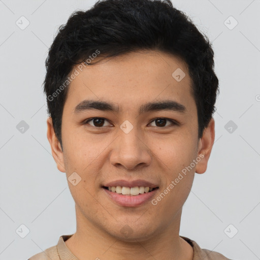 Joyful latino young-adult male with short  brown hair and brown eyes