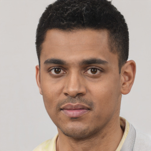 Neutral black young-adult male with short  black hair and brown eyes