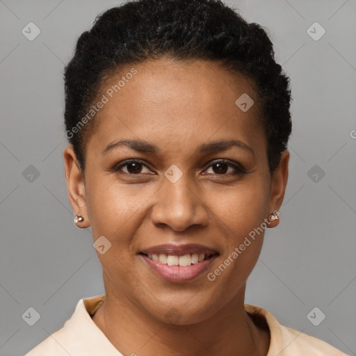 Joyful black young-adult female with short  brown hair and brown eyes