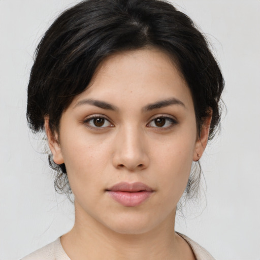 Neutral asian young-adult female with medium  brown hair and brown eyes