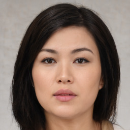 Neutral asian young-adult female with medium  brown hair and brown eyes