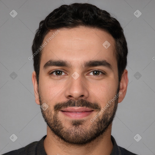 Joyful white young-adult male with short  black hair and brown eyes