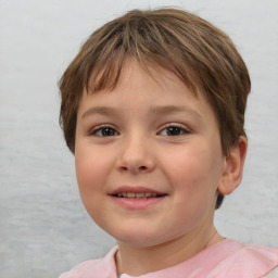 Joyful white child female with short  brown hair and brown eyes