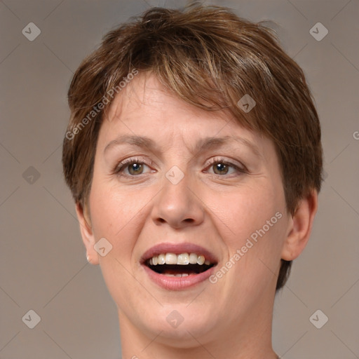 Joyful white adult female with short  brown hair and brown eyes