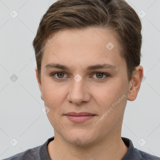 Joyful white young-adult female with short  brown hair and grey eyes