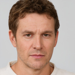 Neutral white adult male with short  brown hair and brown eyes