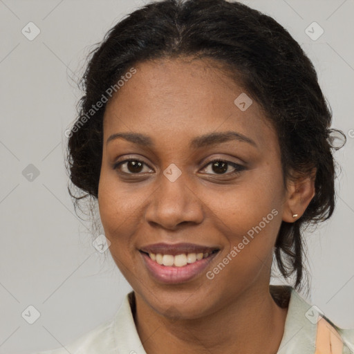 Joyful latino adult female with medium  brown hair and brown eyes