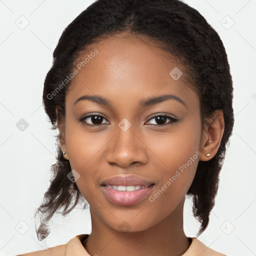 Joyful black young-adult female with long  brown hair and brown eyes