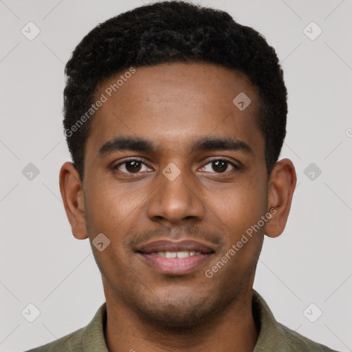 Joyful black young-adult male with short  brown hair and brown eyes