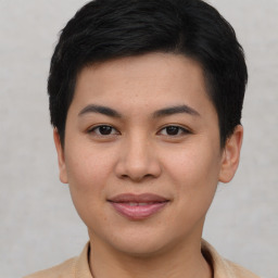 Joyful asian young-adult female with short  brown hair and brown eyes