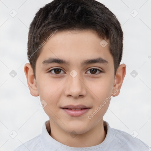 Joyful white child male with short  brown hair and brown eyes