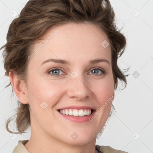 Joyful white young-adult female with medium  brown hair and blue eyes