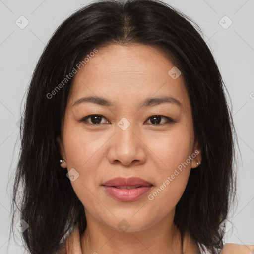 Joyful asian young-adult female with medium  brown hair and brown eyes