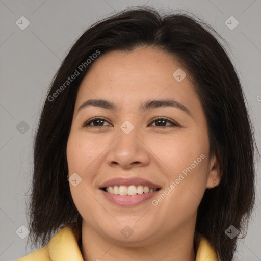 Joyful asian young-adult female with medium  brown hair and brown eyes