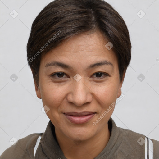 Joyful white adult female with short  brown hair and brown eyes