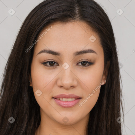 Joyful asian young-adult female with long  brown hair and brown eyes